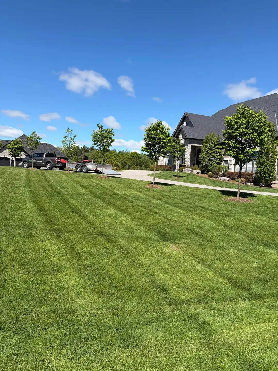 Freshly cut, striped residential lawn in Durham Region
