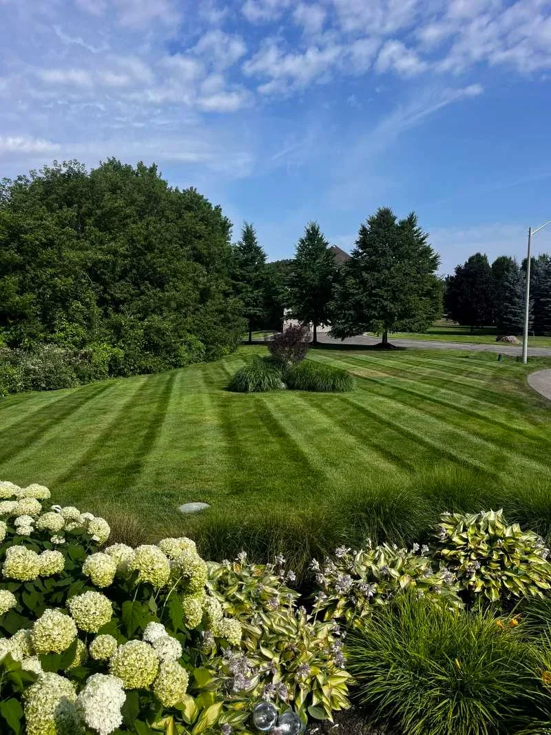 Full-service lawn maintenance including trimming and blowing in Bowmanville