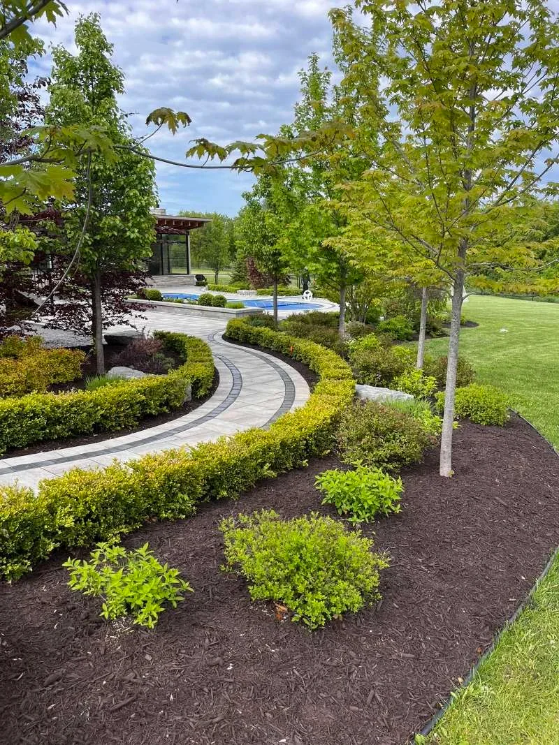 Full-service property maintenance and lawn care for a suburban home in Clarington